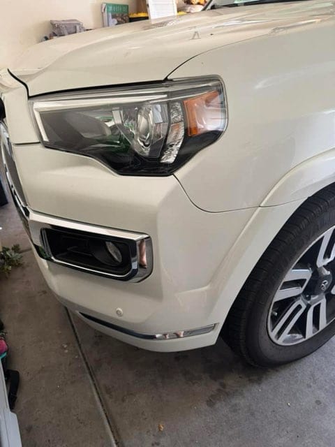 White Toyota 4Runner with ceramic-coated front end