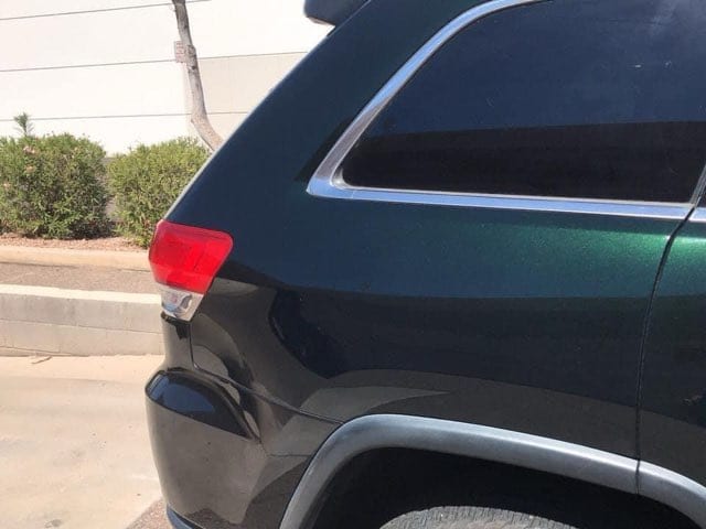 Metallic green Jeep Grand Cherokee paint restored to a deep flake