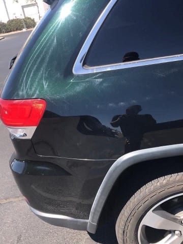 Green Jeep Grand Cherokee exterior detail