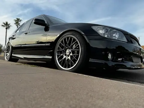 Black Lexus IS with deep gloss paint on custom wheels