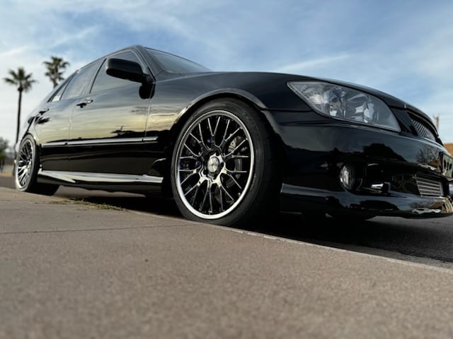 Black Lexus IS with deep gloss paint on custom wheels