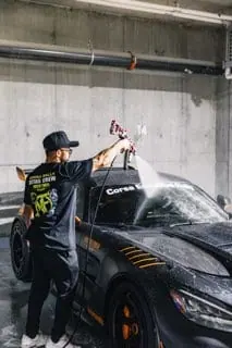 Black Ferrari in the rally garage