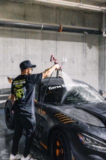 Black Ferrari in the rally garage