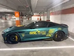 Silver Ferrari F12 with Corsa America banner