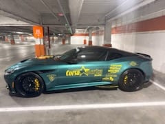Silver Ferrari F12 with Corsa America banner
